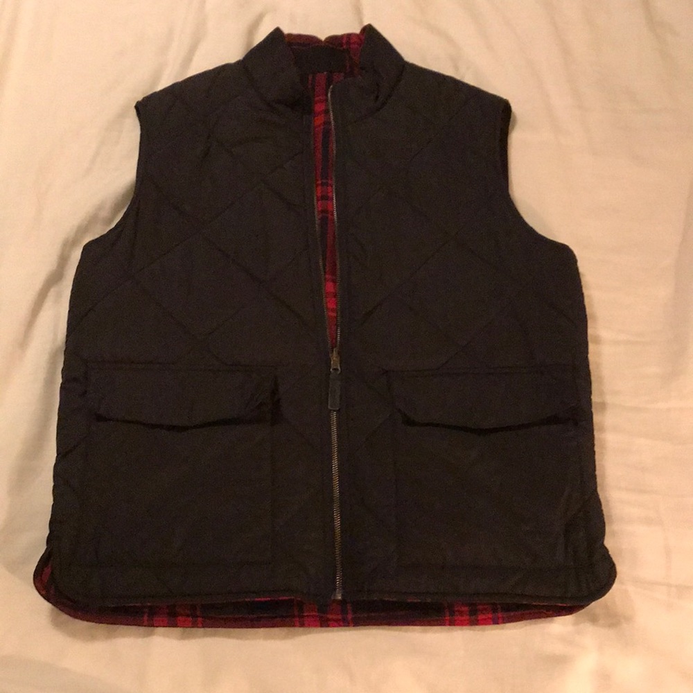 Reversible down filled vest
